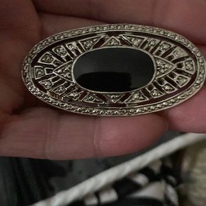 Pretty Pin no marks noted for maker all stones intact  great little piece